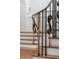 Elegant staircase with wooden steps and decorative iron railing showcasing quality craftsmanship and detail at 3212 Arden Nw Rd, Atlanta, GA 30305