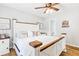 Inviting bedroom with a comfortable bed, decorative pillows, wooden accents and ample natural light at 37 Winesap Ct, Temple, GA 30179