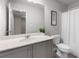 Bathroom featuring single sink vanity and shower with curtain at 5584 Cannonade Ln, Stonecrest, GA 30058