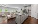 Open concept kitchen with stainless appliances and a clear view of the adjacent living space at 5584 Cannonade Ln, Stonecrest, GA 30058