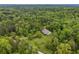 Aerial view of a home nestled among lush greenery at 6125 Fouts Mill Rd, Douglasville, GA 30135
