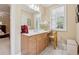 Bathroom with double vanity, natural light, and adjacent to main bedroom at 6125 Fouts Mill Rd, Douglasville, GA 30135
