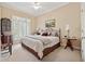 Bedroom with large windows, plush bedding, and an elegant design at 6125 Fouts Mill Rd, Douglasville, GA 30135