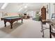 Huge bonus room with pool table, sitting area, and plenty of space for recreation at 6125 Fouts Mill Rd, Douglasville, GA 30135