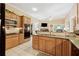 Spacious kitchen with wood cabinets, stone countertops and stainless steel appliances at 6125 Fouts Mill Rd, Douglasville, GA 30135