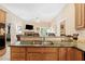 Open kitchen features a breakfast bar, seamless flow to an adjacent Gathering room at 6125 Fouts Mill Rd, Douglasville, GA 30135