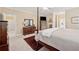 This main bedroom has a four poster bed and calming color scheme at 6125 Fouts Mill Rd, Douglasville, GA 30135