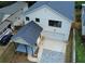 Aerial view showcases the property's driveway, carport, and the home's overall position in the neighborhood at 2167 Main Nw St, Atlanta, GA 30318