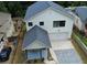 Aerial view showcases the property's driveway, carport, and the home's position in the neighborhood at 2167 Main Nw St, Atlanta, GA 30318