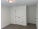 Bright bedroom features neutral walls, carpeted floors, and a closet at 2167 Main Nw St, Atlanta, GA 30318