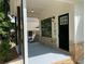 Inviting front porch with modern accents and plenty of room for outdoor seating at 2167 Main Nw St, Atlanta, GA 30318