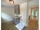 Well-lit laundry room with a modern cabinet and counter space at 2167 Main Nw St, Atlanta, GA 30318