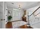 Inviting foyer featuring hardwood floors, natural light, and classic details at 6355 Stallion Dr, Cumming, GA 30040