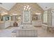 Bright and airy main bathroom featuring a jetted tub, walk-in shower and dual vanities at 6355 Stallion Dr, Cumming, GA 30040