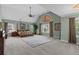 Expansive main bedroom with high vaulted ceilings, large windows, and neutral decor at 6355 Stallion Dr, Cumming, GA 30040
