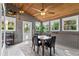 Cozy sunroom with brick accents, a vaulted wood ceiling, and lots of light at 6355 Stallion Dr, Cumming, GA 30040