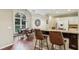 Dining area features high ceilings and a view into the backyard at 6720 Wolford Ct, Johns Creek, GA 30097