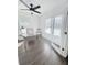 Bright office space with a glass-top desk, white walls, and large windows for plenty of natural light at 1740 Langston Sw Ave, Atlanta, GA 30310