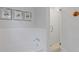 Updated bathroom featuring a glass-enclosed shower and clean, white subway tile at 3527 Starwood Sw Trl, Lilburn, GA 30047