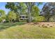 A lovely home nestled among mature trees, offering a serene and private setting at 3527 Starwood Sw Trl, Lilburn, GA 30047