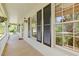 Covered porch with charming details, offering an inviting outdoor space at 3527 Starwood Sw Trl, Lilburn, GA 30047