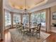 Formal dining room featuring large table and lots of windows at 5045 Harrington Rd, Johns Creek, GA 30022