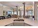 Kitchen with island overlooking living room and dining area at 5045 Harrington Rd, Johns Creek, GA 30022