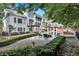 Expansive backyard featuring an outdoor lounge, a luxurious pool area, and lush landscaping for ultimate relaxation at 5045 Harrington Rd, Johns Creek, GA 30022