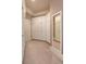Spacious walk-in closet featuring custom shelving, ample storage, and full-length mirror at 5045 Harrington Rd, Johns Creek, GA 30022