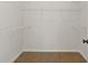 Walk-in closet with basic shelving at 515 Godfrey Dr, Cumming, GA 30040