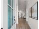 Bright entryway boasting wood floors, high ceilings, and open sightlines at 515 Godfrey Dr, Cumming, GA 30040