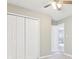 Bright bedroom featuring neutral walls, a ceiling fan, and a closet for storage at 915 Terance Ave, Jonesboro, GA 30238