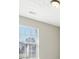 Well-lit room featuring a light fixture and a large window overlooking the outside at 915 Terance Ave, Jonesboro, GA 30238