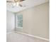 Bedroom with plush carpet, neutral paint, and a ceiling fan with lighting at 915 Terance Ave, Jonesboro, GA 30238
