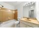 Bathroom featuring a bathtub, tile flooring, single vanity, and standard toilet at 2261 Wellington Cir, Lithonia, GA 30058
