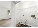 Laundry room featuring hard surface floors, washer hookups, and access to bedroom at 2261 Wellington Cir, Lithonia, GA 30058