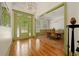 Bright foyer with high ceilings, hardwood floors and decorative glass front door and dining room access at 3380 Canon Bay Dr, Cumming, GA 30041