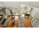 Bright living room boasts vaulted ceilings, a stone fireplace, and large windows with transoms at 3380 Canon Bay Dr, Cumming, GA 30041