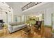 Open living space with hardwood floors, comfortable seating, and a seamless flow to the kitchen at 3380 Canon Bay Dr, Cumming, GA 30041