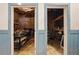 Dual doorway to the storage room with shelves and plenty of storage space at 3380 Canon Bay Dr, Cumming, GA 30041