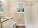 Cozy bathroom featuring granite countertops and white subway tile at 442 Cologne Se Dr, Atlanta, GA 30354