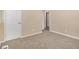 Neutral bedroom with new carpet, complemented by white trim and doors at 442 Cologne Se Dr, Atlanta, GA 30354