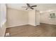 Neutral living room with newer hard wood floors, ceiling fan, and a classic design at 442 Cologne Se Dr, Atlanta, GA 30354