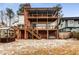 Stunning two-story home with a multi-level deck, patio, hot tub, and beautifully landscaped backyard at 1271 Fenway Cir, Decatur, GA 30030