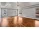Spacious bedroom with hardwood floors, large windows, and a door to the outside deck at 1271 Fenway Cir, Decatur, GA 30030