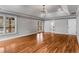 Large bedroom with hardwood flooring and access to a private balcony through sliding glass doors at 1271 Fenway Cir, Decatur, GA 30030