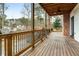 Covered wooden deck overlooking a beautiful backyard at 1271 Fenway Cir, Decatur, GA 30030