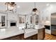 Gourmet kitchen with island, stainless appliances, breakfast nook, and fireplace at 1271 Fenway Cir, Decatur, GA 30030