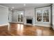 Light filled living room features hardwood floors, a fireplace, and access to the deck at 1271 Fenway Cir, Decatur, GA 30030