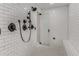 Modern shower with black hardware, white subway tiles, and a built-in bench at 1271 Fenway Cir, Decatur, GA 30030